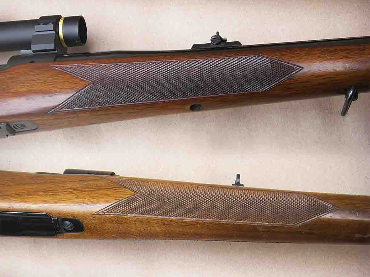 Standard weight Winchester pre-’64 Model 70 rifles (top) feature three guard screws. A fourth screw firmly secured the forearm to the barrel. Featherweight versions (bottom) were void of the barrel screw.